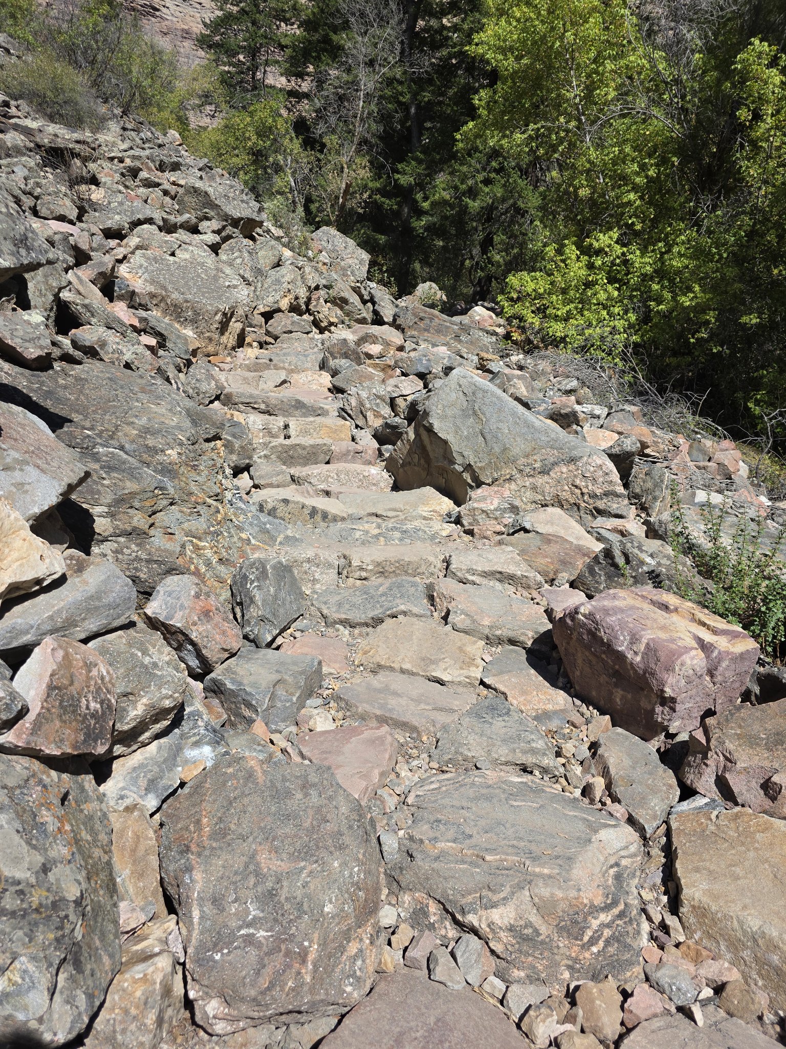Steep rocky section of the trail climbing through the canyon — the infamous Hanging Lake ascent