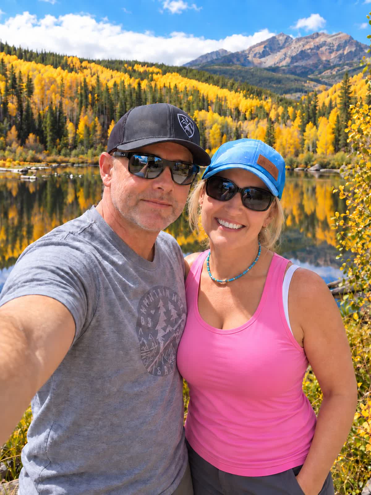 Shane and Michelle at Rainbow Lake, golden aspens and the lake behind them, Frisco Colorado