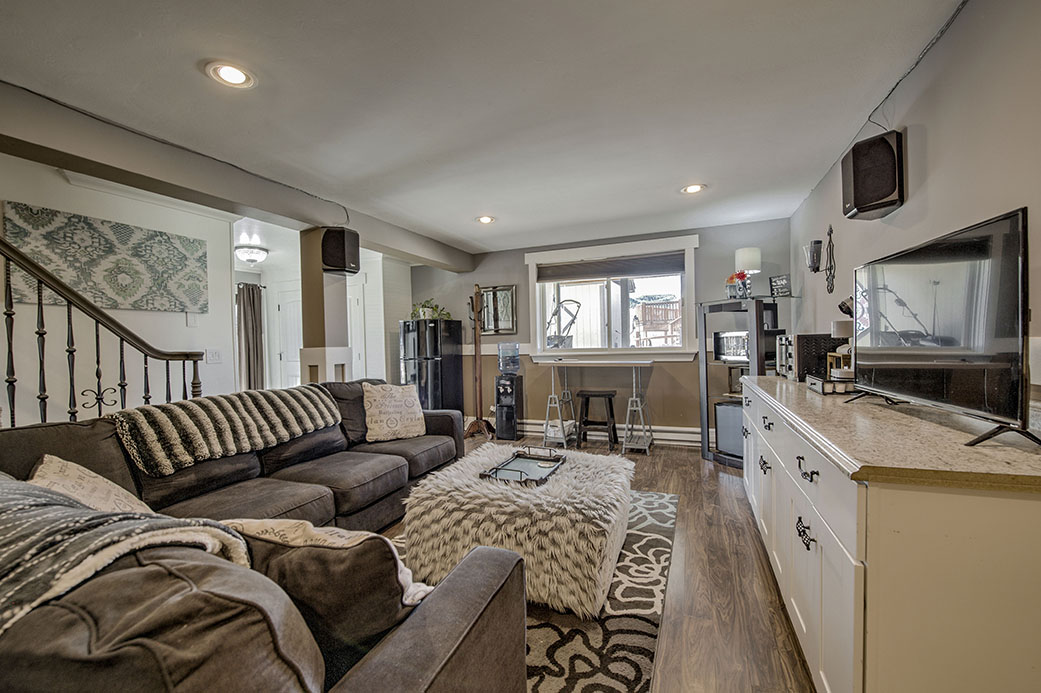 Suite lounge with TV and sitting area